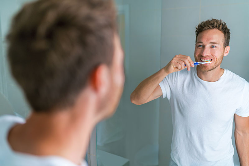 dental patient brushing teeth